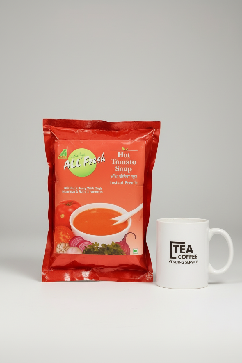 All fresh tomato soup 1kg red pack beside white TEA COFFEE VENDING SERVICE mug on white background