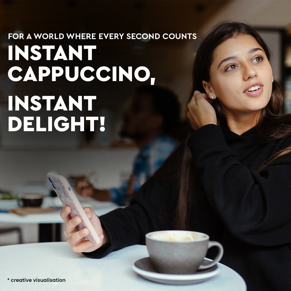 Young woman enjoying a cup of Amazon instant cappuccino powder beverage in a café setting