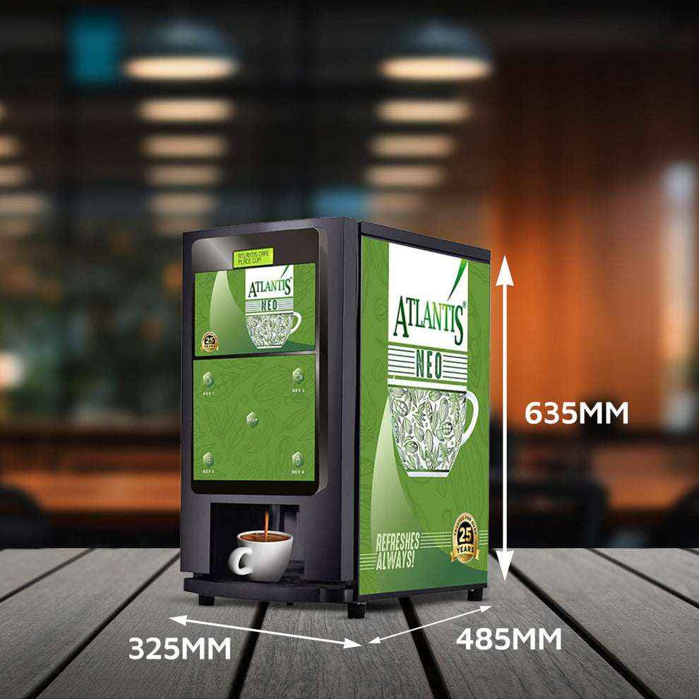 Compact coin operated coffee vending machine Atlantis Neo with green design and cup of coffee dispensing