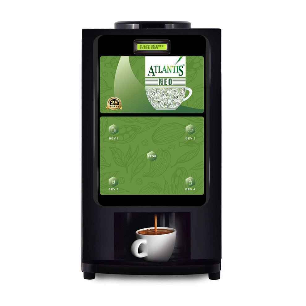 Atlantis Neo black coin operated coffee vending machine dispensing hot coffee into white cup