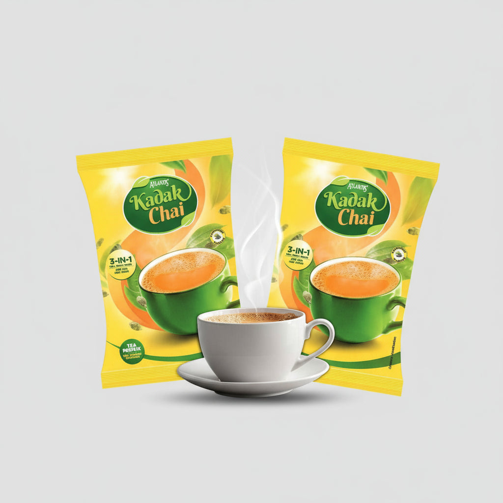 Atlantis Kadak Tea 1kg 3-in-1 P packets with a steaming cup of tea on a white background