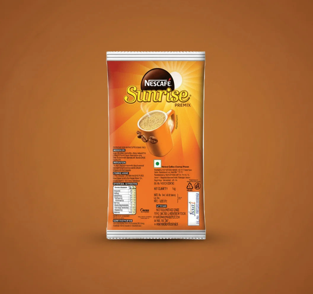 Nescafe Sunrise coffee premix single pack with orange and brown packaging from atlantisplus.com