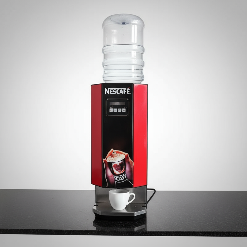 Nescafe vending machine with UPI payment option on black countertop with white coffee cup