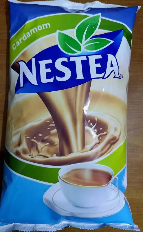 Nestea Masala Gold tea premix packet with cardamom flavor and cup of tea image