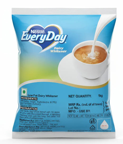 Nestle Everyday dairy whitener 1kg packet with blue and white design pouring into a cup of tea