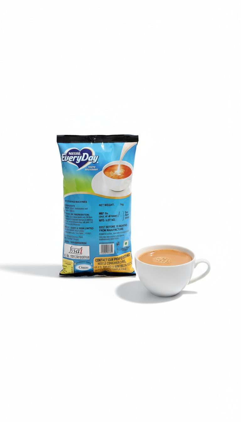 Nestle Everyday dairy whitener 1kg pack with a white cup of tea on a white background